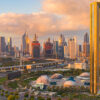 Aerial view of Dubai Frame, Downtown skyline, United Arab Emirates or UAE. Financial district and business area in smart urban city. Skyscraper and high-rise buildings at sunset.